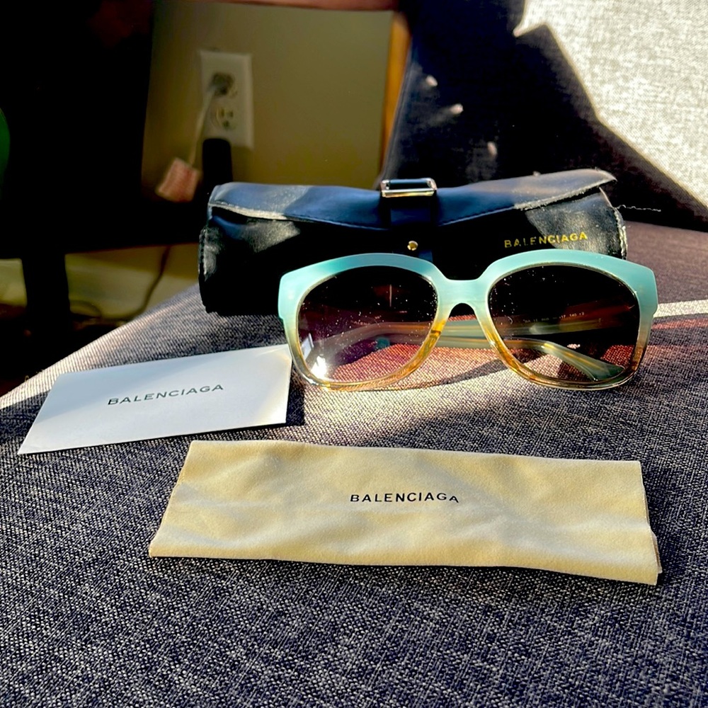 Blue and beige Balenciaga sunglasses.